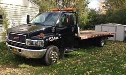 2006 GMC TOPKICKER C5500. $23,500.00. WAS ASKING $25,000.00. CHECK OUT OTHER SIMILAR TRUCKS - THEY WANT $30,000.00 + - ALSO, HIGHER MILEAGE ON THEM.
IT'S A DURAMAX DIESEL ENGINE - AUTOMATIC - SPRING SUSPENSION - 19.5 TIRES - 21 FT. DANCO STEEL DECK.
HAS