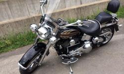 - 2006 Harley Davidson Deluxe in great shape.
- Factory numbered paint set # 19 of 150.
- Custom matching wheels and rotors.
- Quick detachable windshield.
- 1 1/2 fat Heritage handlebars.
- Custom matching mirrors, floorboards, and shift linkage.
-