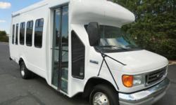 Excellent condition 2006 Ford E-450 Startrans fiberglass body 12 passenger plus driver shuttle bus. This beautifully well maintained bus has a rugged and dependable low mileage Triton 6.8L V-10 engine which delivers superb performance and power under