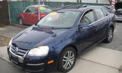 Royal Motors is happy to present 2006 Volkswagen Jetta Navy. We'll have you wishing your commute never ends! The rich Navy Exterior and the Tan Interior finish gives this Volkswagen a sleek and sophisticated look. Drive this Pre-owned 2006 Volkswagen