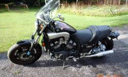 2006 Yamaha V-Star Classic 1100- all dressed up, studded seat and saddlebags, windshield, sissy bar with luggage rack, Lindby crash bars, passing lights, all Yamaha accessories. I've kept this bike in good shape including any services that have been