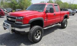 Up for your consideration this just in 2 owner Carfax certified and in very good condition lifted , High rider 07 Classic 2500 HD Ext 4x4 equipped with Chevrolets mighty 6.6 duramax Diesel engine with banks aftermarket fuel programmer, Ice Cold AC, fully