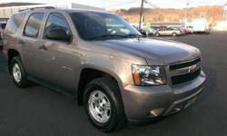 Look at this 2007 Chevrolet Tahoe . It has an Automatic transmission and a Gas/Ethanol V8 5.3L/323 engine. This Tahoe features the following options: Windows, power with driver Express-Down and lockout features, Visors, driver and front passenger