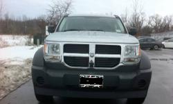 2007 Dodge Nitro SXT Sport Utility 4WD
Engine : V6, 3.7 Liter
Mileage : 56.000
Horsepower : 210 @ 5200 RPM
Gas Mileage : City 15/Hwy 21
Transmission : 4 Speed Automatic
Drive train : 4WD + 2WD (Rear)
Traction Control, Stability Control, ABS (4-Wheel),