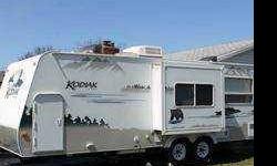 2007 Dutchmen Kodiak Ultra Lite Travel Trailer Fully self contained Sleeps 8 2 slide outs 25 feet Internal Features Queen size bed, slide out Two full size bunks Fold down couch Collapsible dinette Built in AM, FM, CD player with inside and outside