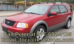 Call 917.692.4108 if interested. 2007 Ford Freestyle SEL 5 door Full Size Crossover in excellent condition. The car has a CARFAX clean title guarantee. 6-Passenger Seating; Red Metallic exterior in excellent condition with no dents. Grey cloth interior in