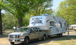 2007 Montana model 3500 RL by Keystone 34995 or BO. Four slides loaded with all the upgrades. Glass enclosed shower, washer & dryer king size bed. Satellite equipped, Fireplace. - See more at: http://www.rvregistry.com/used-rv/1001025.htm
