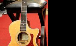 One Owner, PERFECT MINT CONDITION! Original Hardshell Case included as well as Paperwork, Tags, etc.
Featuring one of the most comfortable body styles ever, the US Made Taylor 412-CE Grand Concert Cutaway Acoustic-Electric Guitar is a gem that sounds a