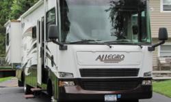 !
2007 Tiffin Allegro 32BA * Ford Chassis
Ford 6.8L V10 362HP * Double-Slide * 22,700 Miles
.
All standard equipment plus more: 50A Surge Guard Protector with remote display 5.5 KW Onan Generator Semi Auto King Dome Satellite 2nd roof A/C, 15K BTU with