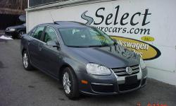 German trim accents this great driving and economical Jetta. We did note a prior deer impact that was not major and was well repaired, nothing hidden:). 5SPD, Alarm, Power Seats,Rear Trunk Release,Cup Holder,Heated Seats,Clock,Heated Mirrors,Power Mirrors
