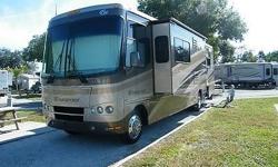 Stock Number: 710826. full auto awnings 11 ft,16 ft long, auto leveling jacks, queen bed,3 TVs, surround sound radio, DVD player, 10 gal water heater, video backup camera, cruise control, 2 air conditioners, EXCELLENT CONDITION, only 10k miles on 362hp