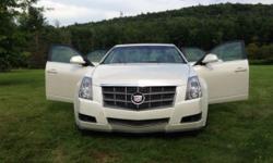 Pearl white Cadillac CTS 2008. Please serious inquiries only. This vehicle is going for a lower then usual price due to the fact it has a salvage title. Cadillac has BOSE sound system, moonroof, tan leather interior, OnStar option, RWD and sport mode