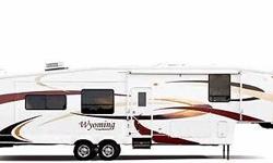 LOOK AT THIS EXCELLENT 37 FOOT 2008 Coachmen WYOMING FIFTH WHEEL TRAILER!!! NON-SMOKING & NO PETS. LOTS of FEATURES INCLUDING: Dual Roof Air Conditioning, Custom RV cover, THREE SLIDE OUTS, Hitch, Fireplace, Outside shower, China Cabinet, Computer Desk