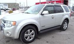 Check out this 2008 Ford Escape Limited. It has an Automatic transmission and a Gas V6 3.0L/181 engine. This Escape features the following options: Battery saver feature, Pwr point w/cap in floor console & in rear, Rear window defroster, Instrument