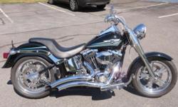 CHECK THIS ONE OUT!!!
CUSTOM WHEELS, WITH MATCHING SPROCKETS. P.M. BRAKES, Carlini handlebars with braided lines. Chrome controls, chrome front end, floorboard mounted custom highway pegs, and custom floorboards and pegs. Vance and Hines exhaust with a