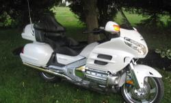 2008 Honda GL1800 Goldwing, 17,000 miles, Pearl White, Premium Audio, Heated Seats and Grips, Navigation, MP3 Player installed (operates with motorcycle's CD player controls), serviced at 16,000 miles: replaced spark plugs, brake fluid, shaft drive fluid,