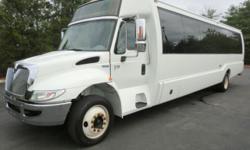 2008 International 3200 Krystal Koach KK38 diesel luxury coach bus with 30 mid-back seats plus driver, copilot and 2 wheelchair positions and overhead luggage and Braun wheelchair lift. The International DT466 diesel engine is known for being extremely