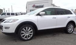 Look at this 2008 Mazda CX-9 Grand Touring. It has an Automatic transmission and a Gas V6 3.7L/227.4 engine. This CX-9 has the following options: Indirect front/rear door lighting, Heated front reclining bucket seats w/8-way pwr adjustable driver seat,