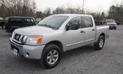 Up for your consideration this just in Carfax certified 1 owner no issue 2008 Nissan Titan is the SE edition Crew Cab 4x4.. Fully loaded with power windows,locks,tilt steering and cruise control , CD player aluminum wheels with decent tires, Silver in