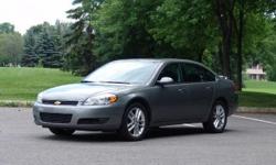 2009 Charcoal Grey Chevy Impala LT. leather interior, heated power seats. Odometer 68.5K. Blue book value range is $10,602 - $13,195. Blue book "fair purchase price is $11,900. Was $27,000 new