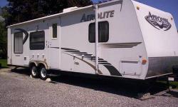 Used 11 times since purchased new in 2010. . . (lots of leg room). Original Owner. INTERIOR FEATURES: Vinyl Floors, Carpet, Maple Cabinets, Full Kitchen, Top/Bottom Fridge, Microwave, Stove Top, Toilet and sink on one side and shower on the other -