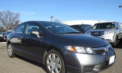 Come see this 2009 Honda Civic Sdn LX. It has an Automatic transmission and a Gas I4 1.8L/110 engine. This Civic Sdn features the following options: Pwr windows w/driver auto-up/down, Remote trunk release w/lock, Compact spare tire & wheel, 2-tier