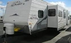 2009 Jayco Jay Flight G2 32 BHDS. It has a great kids bedroom with bunk slideout and entertainment center with loft bed. Also has a second outside door with quick access to the bathroom. It features a flatscreen LCD TV and electric awning as well as