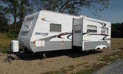 2009 Keystone 310kbs , EXCELLENT CONDITION 30ft 2 Slides, Front Kitchen, Dining Area (table & 4 chairs) Rear Bedroom Suite w/ King Bed Slide, Lots of Extras & Lots Storage, Comes w/ Transferable Warranty that Covers everything w/ $200 deductible (camping