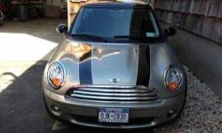 2009 MINI Cooper Coupe 16,315 miles Rear wheel drive Leather bucket seats Automatic transmission 2 door Exterior is Gold and Black with Gray interior New tires and breaks Keyless entry 30 mpg Driver, passenger and side air bags Alarm Alloy wheels Heated