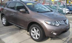 Royal Motors is happy to present this Low Mileage 2009 Nissan Murano AWD. We'll have you wishing your commute never ends! The rich Desert Sand Exterior and the Black Interior finish gives this Nissan a sleek and sophisticated look. Drive this Pre-owned