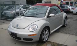 Royal Motors is happy to present this 2009 Volkswagen Beetle Convertible. We'll have you wishing your commute never ends! The Rich White Gild Exterior and the Red Leather Interior finish gives this Beetle a sleek and sophisticated look. Drive this