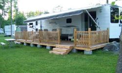 This trailer has been a dream, and very relaxing during the summer months. It looks brand-new and everything works. It has two slide-outs (one being 19 ft. long, in the dining and living room area (reference attached pictures). There are a number of