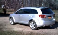 The 2010 Dodge Journey offers minivan conveniences without the minivan stigma and pricing Perfect crash test scores with interesting entertainment and communications options 3.5L V6 engine Automatic transmission Up to 16 Town 24 Country mpg All wheel