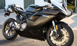 2010 Ducati 848 that has never been registered or put into service which comes with a full factory warranty starting the day I sell it. There are no programs, rebates, accessories, trips to Indy for the MotoGp, the selling price includes the bike and the