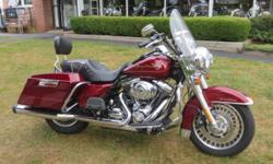 THIS IS A VERY NICE ROAD KING!
Start off with the Harley BOOM! AUDIO CRUISER AMP AND SPEAKER KIT, and go from there. It also has the Harley leather tank pouch for your i-pod! The derby cover, air cleaner cover, gas cap cover, are from the Harley "SKULL"