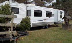 2010 North Country 32 ft Tow Behind Camper This is a 32 foot tow behind camper that we bought brand new and used very little. It still looks an smells new. Description: Sleeps 8 2 slide outs Air Conditioning (A/C) Jensen Sound System Swivel, 19 inch LCD
