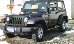 With just under 25,000 miles this Jeep is in like new condition Metallic green exterior two toned with tan Leather interior Am Fm Cd Player 3.8L V6 engine Manual transmission Up to 15 Town 19 Country mpg 4-wheel drive MP3 Player Stability Control Side