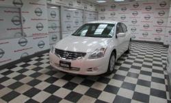 Sensibility and practicality define the 2010 Nissan Altima! This spectacularly designed vehicle challenges higher-priced competitors in its class! All of the following features are included: front and rear reading lights, power door mirrors, and remote