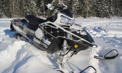 -2010 Polaris 600 CFI Switchback
-Walker Evens Front and Rear Suspension
-2300 Miles
-Fuel Injected, Liquid Cooled 600 2-Stroke
-Wrap Kit
-136? Track, Studded, 1.25? Lugs
-Electric Start, Hand and Thumb Warmers
-Push Button Reverse, Digital Information