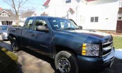 2011 Chevrolet Silverado in Excellent Condition Graphite Blue Exterior Titanium Grey Cloth Interior V8 Engine with 28,000 Miles Extended Cab Equipped with Snow Tires Cruise control Retained accessory power Power steering 12V front power outlets Tilt