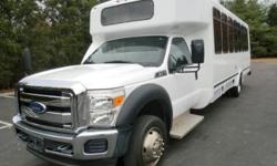 New Style 2011 Ford F-550 27 passenger shuttle bus with 96K miles! It is equipped with a powerful trouble free 6.8L Ford V-10 gas engine and smooth shifting five speed automatic transmission with overdrive. This bus is nicely appointed with dual A/C and