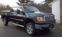 2011 GMC Sierra SLE 2500HD Crew 4x4. Truck is in excellent condition, only 12,800 miles. Black with dark cloth interior, 20" OEM wheels, 6.0 Votec gas engine, trailering package, snow prep package with dual batteries, 6' OEM steps, remote start, Bluetooth