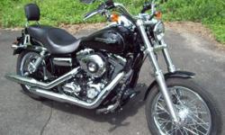 Excellent condition, looks and runs great!
The 2011 Harley-DavidsonÂ® DynaÂ® Super GlideÂ® Custom FXDC is a bike with the power you need and all the HarleyÂ® chrome you want. The Super GlideÂ® Custom motorcycle holds true to its name with unique, custom