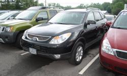 Cloth. Come to the experts! Back in Black! If you've been thirsting for just the right 2011 Hyundai Veracruz, then stop your search right here. This great SUV is the one-owner catch that is sure to dazzle. It has plenty of passenger space and a hatch area