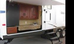 2011 312BH KEYSTONE OUTBACK!
SPECIAL ORDERED CAMPER. 1 OF A KIND!
Steal it now! I want it gone!
ONLY USED 4 TIMES. All locally.
STILL LOOKS AND SMELLS NEW!!!
An absolute beautiful camper. MANY EXTRAS!
Super Lite to pull!
32 Foot. Actual length 35'10"