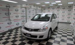 Get excited about the 2011 Nissan Versa! This spectacularly designed vehicle challenges higher-priced competitors in its class! Top features include power windows, a rear window wiper, a tachometer, and a split folding rear seat. It features a