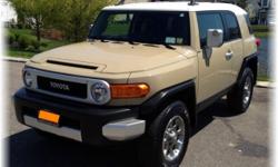 2011 Toyota FJ Cruiser -- 4.0 Liter V6 Rear Wheel/Four Wheel Drive -- Loaded - Single Owner,
Non-Smoker, Mint Condition, Well Cared For, Low Mileage, Owner's Manual, Extended Warranty Included, Original Window Sticker, Serviced by Toyota Dealer