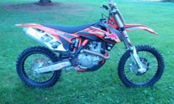 This is the Original Dungey Replica 2012 1/2 ( mid year release ) KTM450FE Factory Edition. Red Bull Racer. Brand new radiator shrouds, new Fender decals for the front and rear new in package. The original shrouds are still very nice, but I purchased an