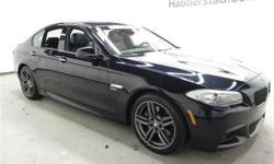 Elegantly expressive, this 2012 BMW 5 Series banished all limitations in creating every last detail. It is stocked with these options: Rear-view camera, Fold-up rear seat center armrest, Dynamic Cruise Control, Tire Pressure Monitor, Interior courtesy