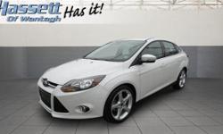 Come see this 2012 Ford Focus Titanium w/Navigation. It has a transmission and a Gas I4 2.0L/121 engine. This Focus has the following options: Front/rear floor mats, Leather-wrapped steering wheel, Tilt/telescopic steering column, Anti-lock brakes (ABS),
